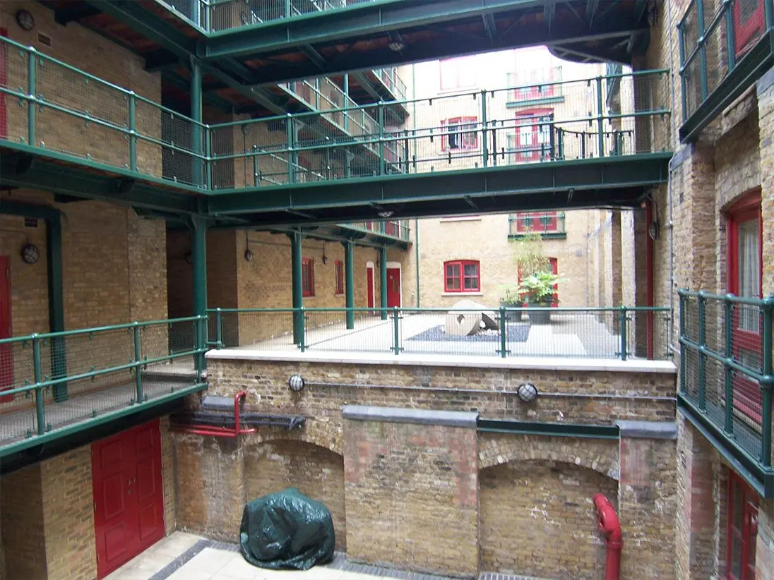 The galleried internal courtyard of Globe Wharf, once the working heart of the rice mill